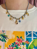 Collier à breloques bleu