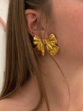 Boucles d’oreilles noeud